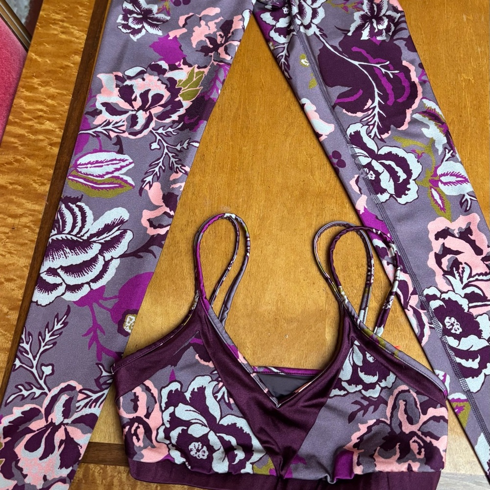 Maaji 2 piece activewear. Size small. Burgundy is the main color. New with tags